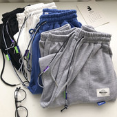 Pantaloni casual dama cu elastic si emblema