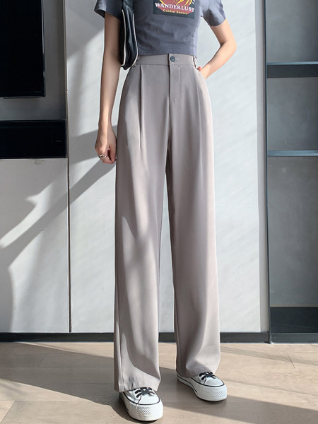 Baltos ir juodos moteriškos kelnės aukštu juosmeniu ir kišenėmis