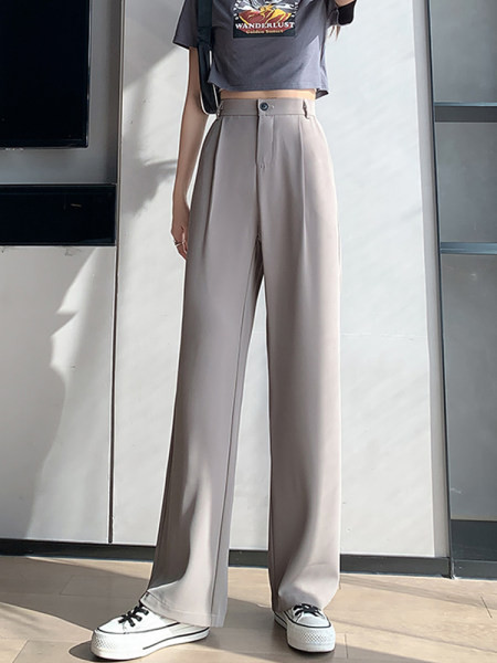 Baltos ir juodos moteriškos kelnės aukštu juosmeniu ir kišenėmis