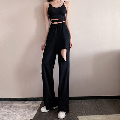 Pantaloni de dama cu o parte decupata si talie inalta