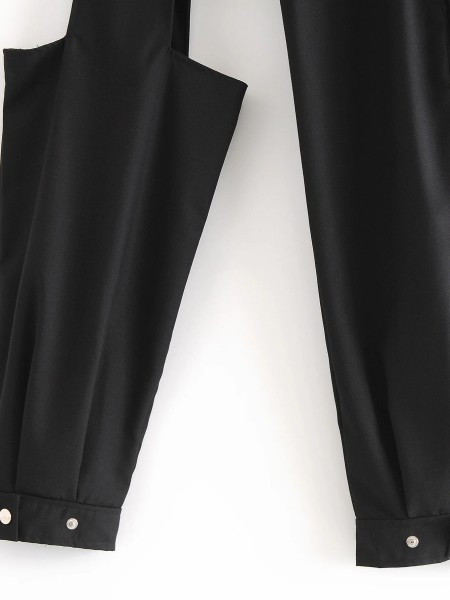 Асиметричен дамски панталон с изрязани части