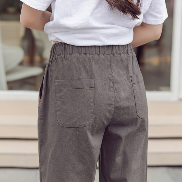 Pantaloni casual dama cu model cu buzunare late