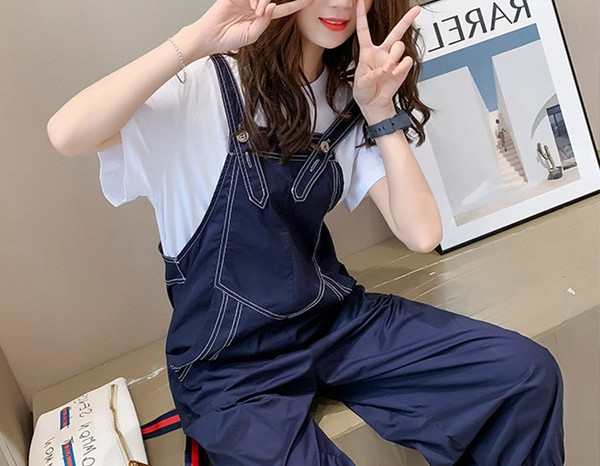 Salopetă modernă de damă în negru și albastru