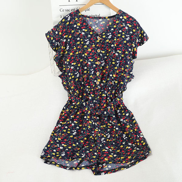 Γυναικεία κοντή ολόσωμη φόρμα με λουλουδάτο μοτίβο και ελαστική μέση