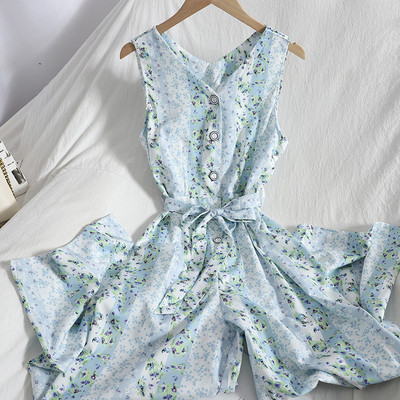 Μακρύ γυναικεία ολόσωμη φόρμα με λουλουδάτο μοτίβο και κουμπιά