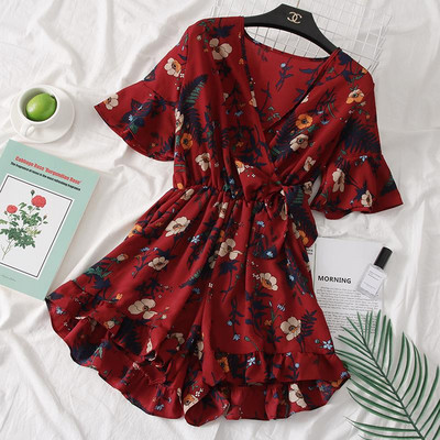 Salopetă colorată de damă cu mâneci scurte și motive florale