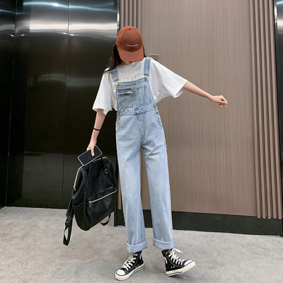 Salopeta de dama model nou din denim cu buzunar albastru