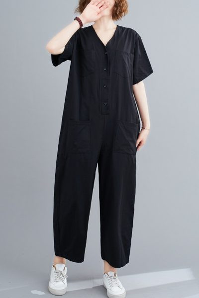 Γυναικεία μοντέρνα μονόχρωμη  ολόσωμη φόρμα με κοντά μανίκια και τσέπες