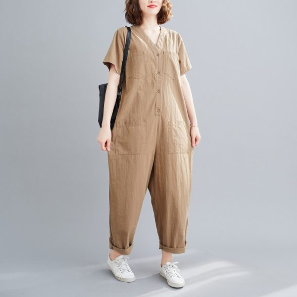 Γυναικεία μοντέρνα μονόχρωμη  ολόσωμη φόρμα με κοντά μανίκια και τσέπες