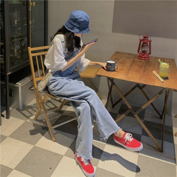 Novi model ženskog teksas kombinezona sa poderanim elementima