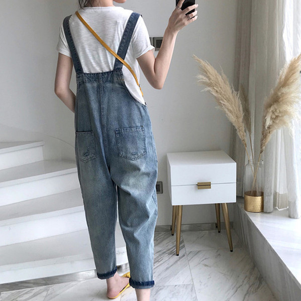 Ležerni kombinezon s gumbima i džepovima