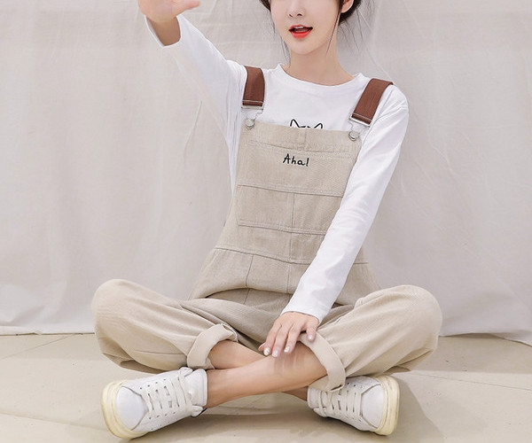 Salopeta de dama din denim cu bretele in negru si bej