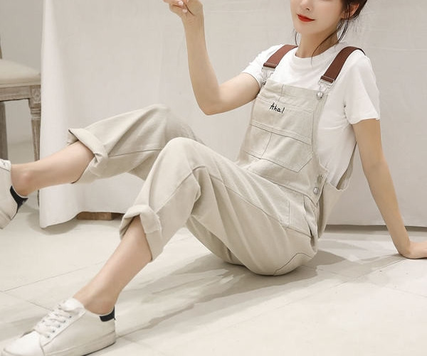 Salopeta de dama din denim cu bretele in negru si bej