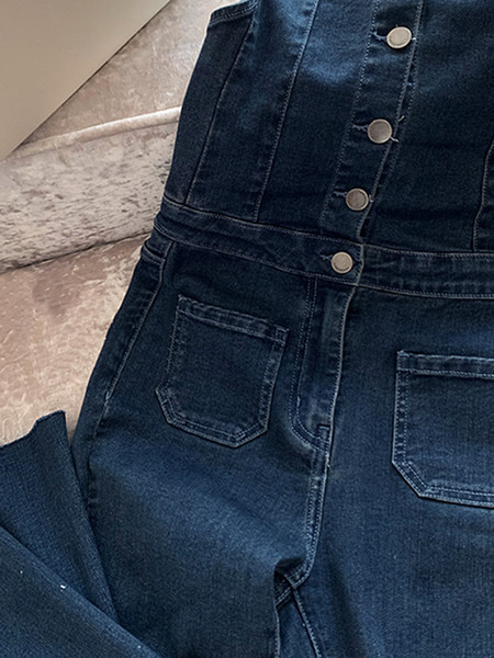 Μοντέρνα γυναικεία ολόσωμη φόρμα με τιραντάκια με κουμπιά 