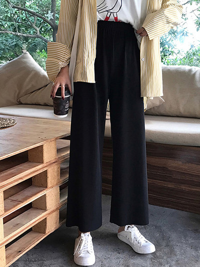 Дамски модерен широк панталон с висока талия в черен цвят 