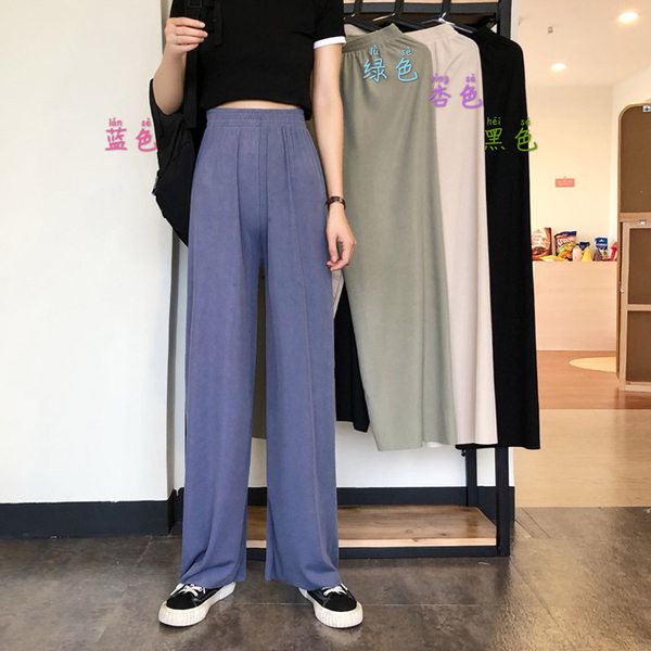 Vienspalvės plačios moteriškos kelnės aukštu juosmeniu