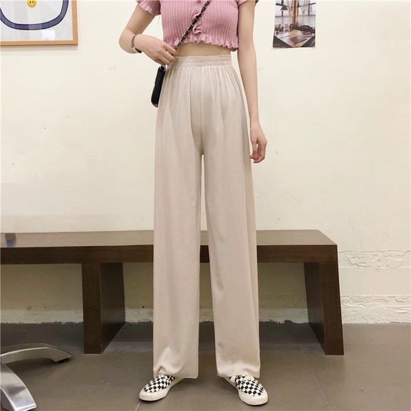 Vienspalvės plačios moteriškos kelnės aukštu juosmeniu