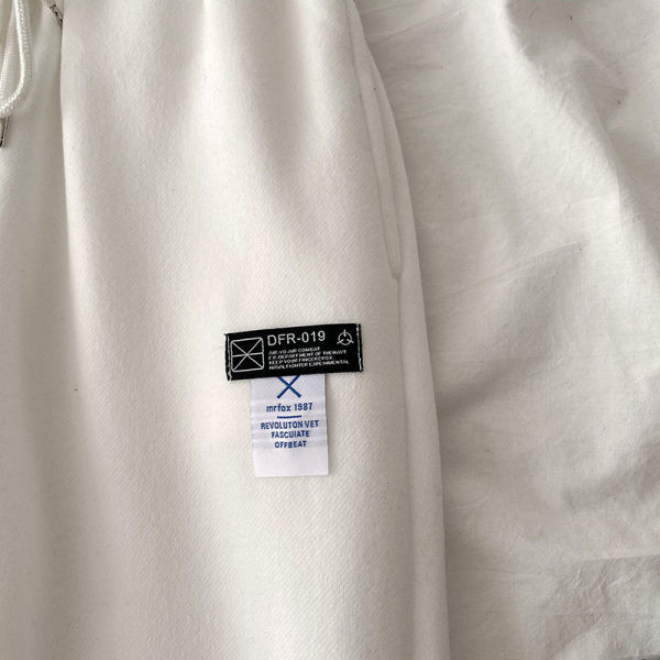 Pantaloni sport dama cu cravate si emblema