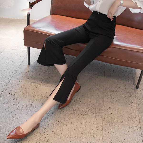 Moderne ženske hlače s prorezima i visokim strukom