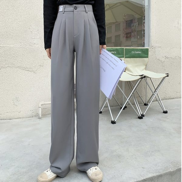 Model larg de pantaloni de dama cu talie inalta si buzunare