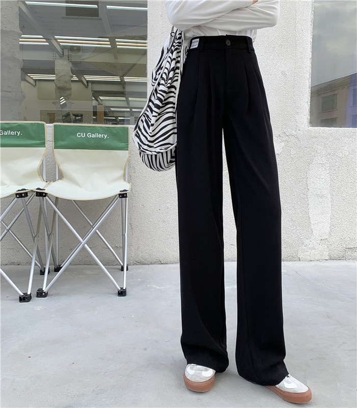 Model larg de pantaloni de dama cu talie inalta si buzunare