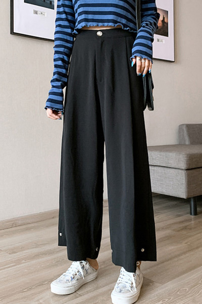 Pantaloni largi de dama cu nasturi