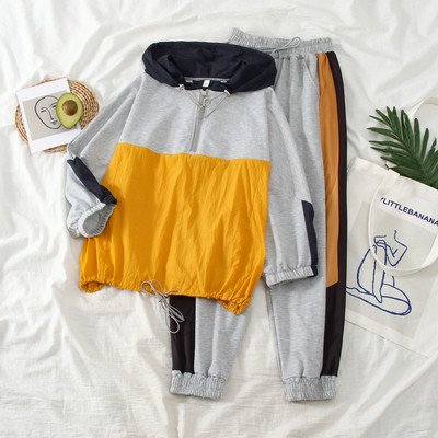 Ženski sportski komplet hlača i bluze s kapuljačom