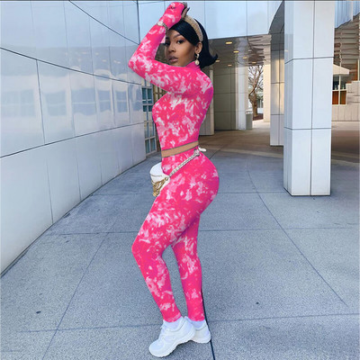 Moderan ženski komplet tajica i kratke dukserice sa patentnim zatvaračem