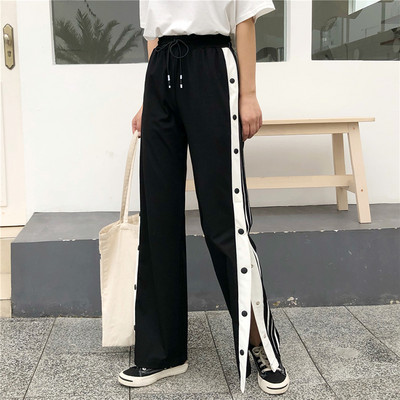 Ženske ravne hlače s visokim strukom i gumbima