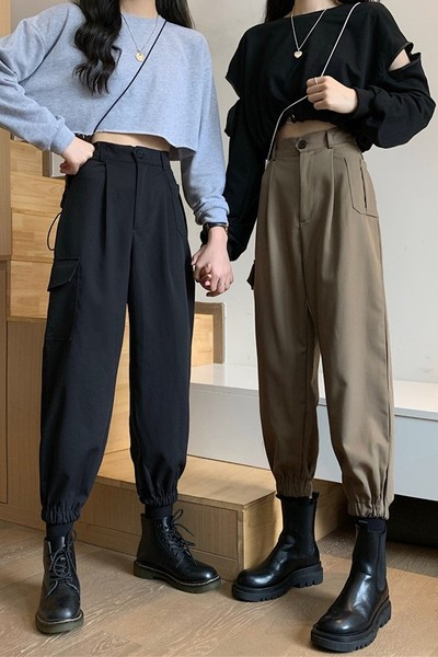 Ženske hlače s džepovima i gumbima