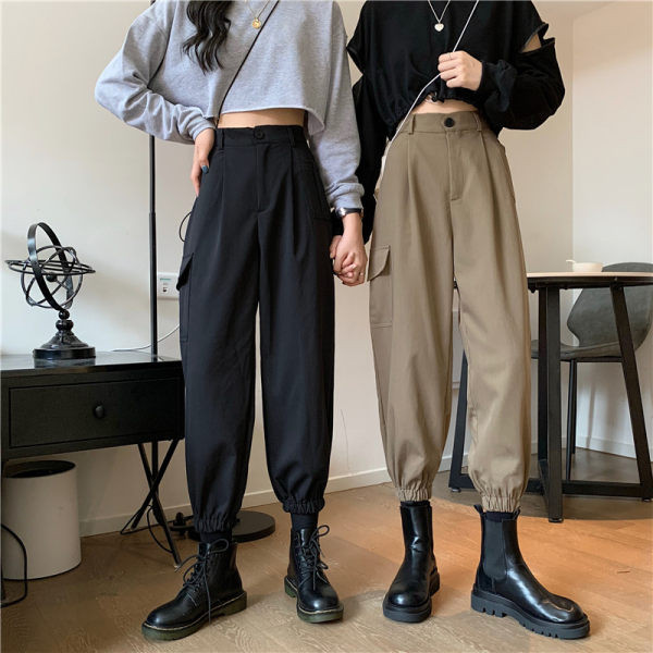 Ženske hlače s džepovima i gumbima