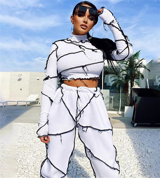 Set de damă de ultimă generație de pantaloni lungi și o bluză scurtă