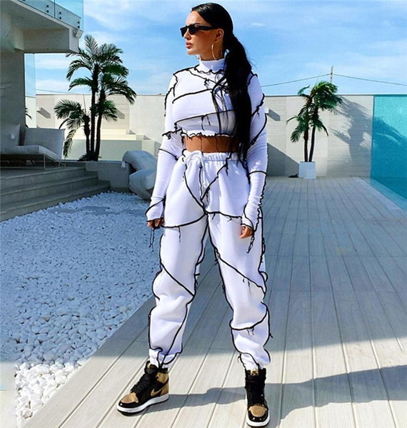 Set de damă de ultimă generație de pantaloni lungi și o bluză scurtă