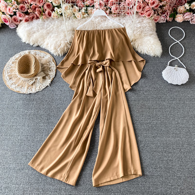 Γυναικεία καθημερινή ολόσωμη φόρμα  με ζώνη και γυμνούς ώμους