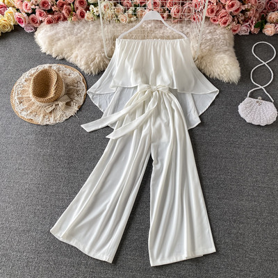 Γυναικεία καθημερινή ολόσωμη φόρμα  με ζώνη και γυμνούς ώμους