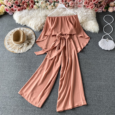 Γυναικεία καθημερινή ολόσωμη φόρμα  με ζώνη και γυμνούς ώμους