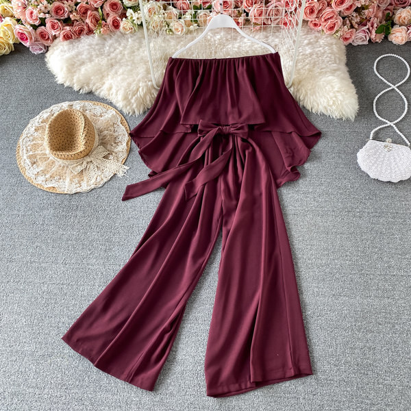 Γυναικεία καθημερινή ολόσωμη φόρμα  με ζώνη και γυμνούς ώμους