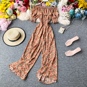 Ženski dugi kombinezon s cvjetnim uzorkom i kovrčama