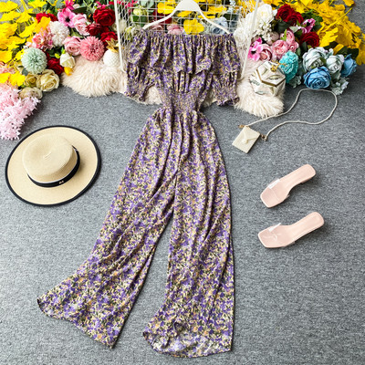 Ženski dugi kombinezon s cvjetnim uzorkom i kovrčama