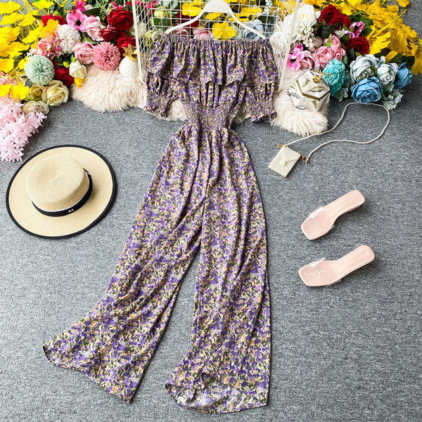 Ženski dugi kombinezon s cvjetnim uzorkom i kovrčama