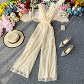 Salopetă lungă de damă la modă cu dantelă și bretele încrucișate pe spate