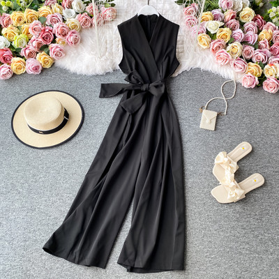 Salopetă lungă de damă cu decolteu spitz și cravate