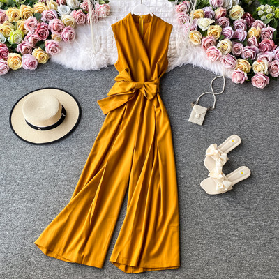 Salopetă lungă de damă cu decolteu spitz și cravate