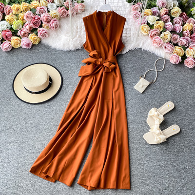 Salopetă lungă de damă cu decolteu spitz și cravate