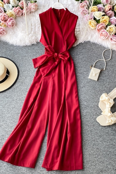 Salopetă lungă de damă cu decolteu spitz și cravate