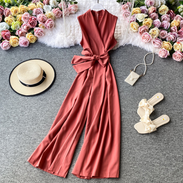 Salopetă lungă de damă cu decolteu spitz și cravate