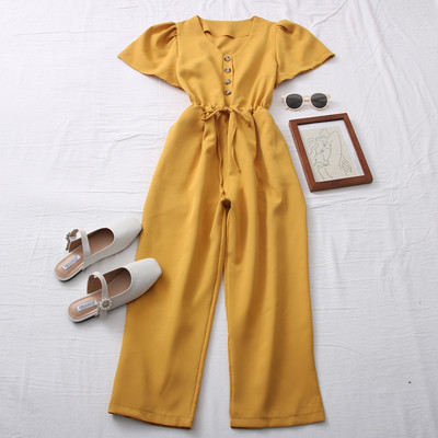 Model nou de salopetă de damă cu mâneci scurte și nasturi