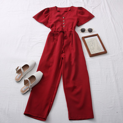 Model nou de salopetă de damă cu mâneci scurte și nasturi