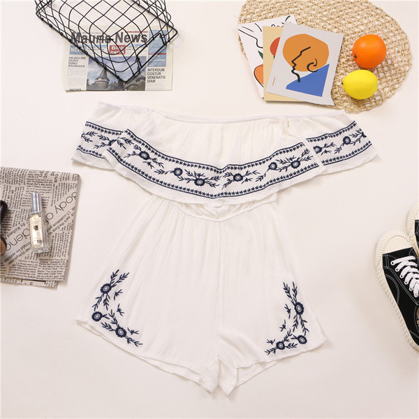 Salopeta de dama moderna cu decolteu barca si broderie