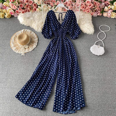 Salopetă largă de damă cu decolteu cu buline